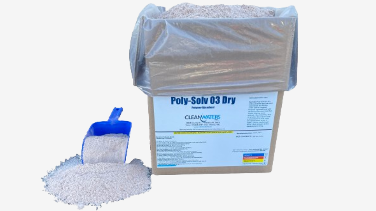 A container of poly-solv 0 3 dry is next to a scoop.