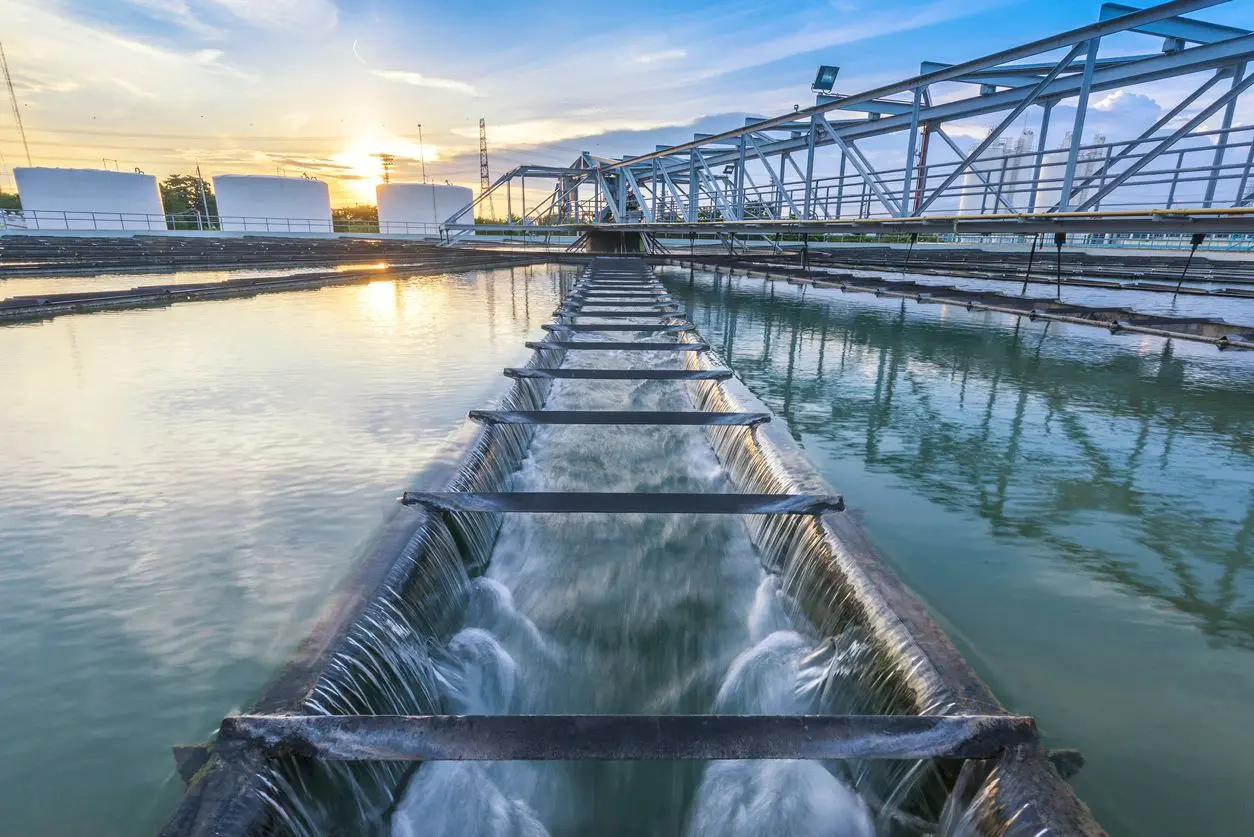 A large water plant with pipes running through it.